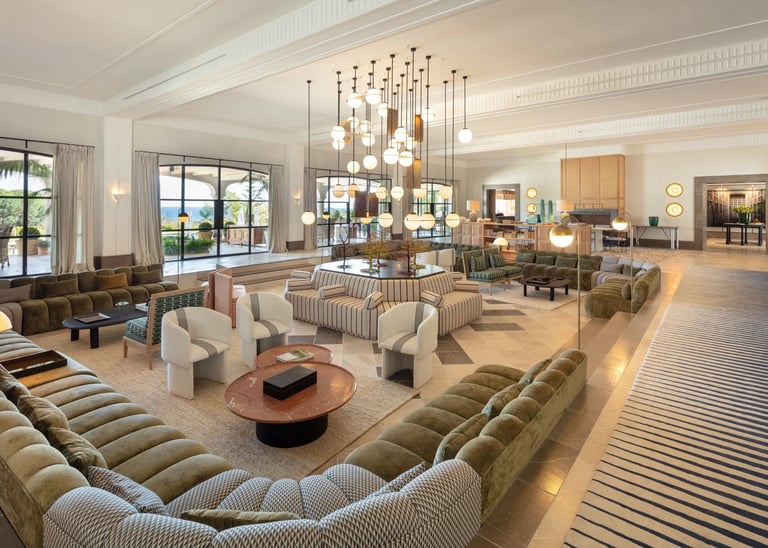 Salon at Villa La Gratitud with chandeliers and custom furnishings