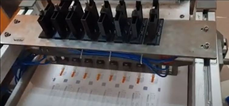 Ophthalmic strip packing machine