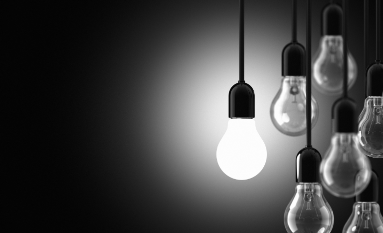 a bunch of light bulbs hanging from a ceiling, contento consulting, creazione concetti