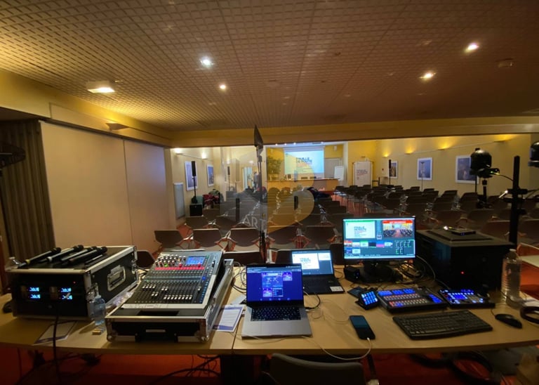 a table with a laptop and a laptop computer