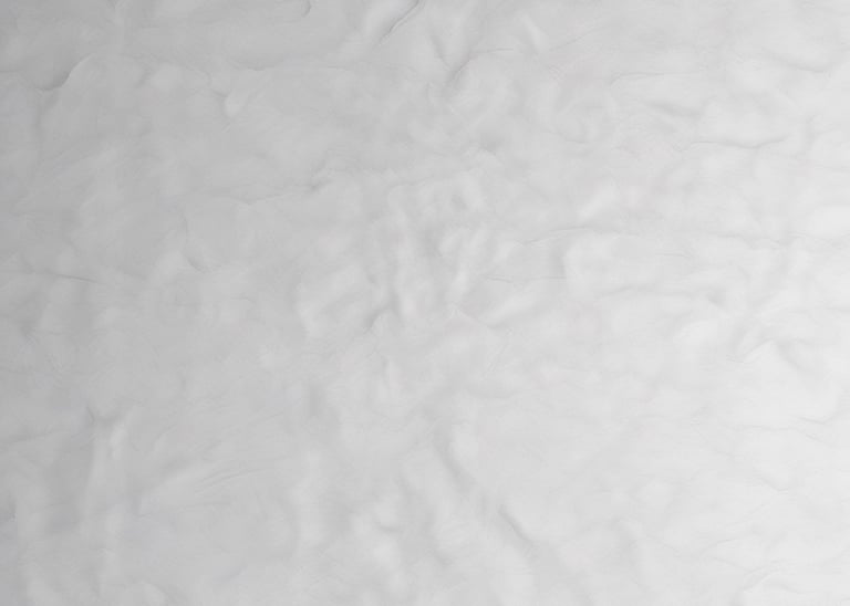 A solar-powered irrigation pump operating in a lush green farm field under bright sunlight.