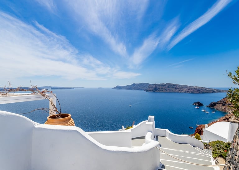 Santorin a view of a sea view of a boat in the water