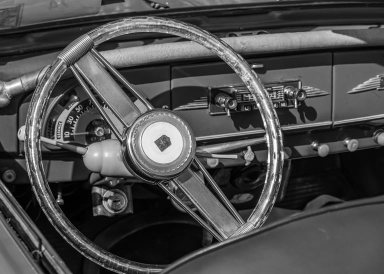 a steering wheel of a Peugeot car with a steering wheel