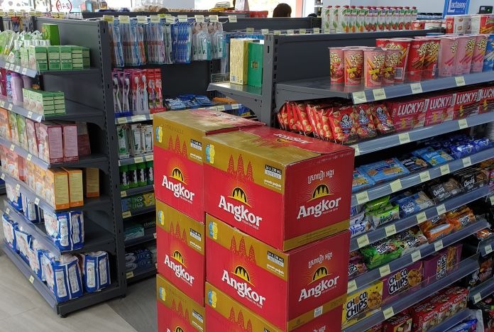 a store display of a variety of drinks and snacks