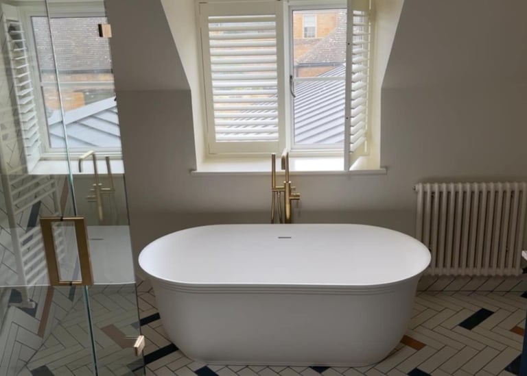 Luxury bathroom refurbishment with fitted bathtub and vanity unit in Worcestershire
