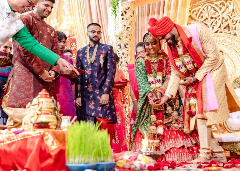 Indian Groom and Bride are offerings to holy fire