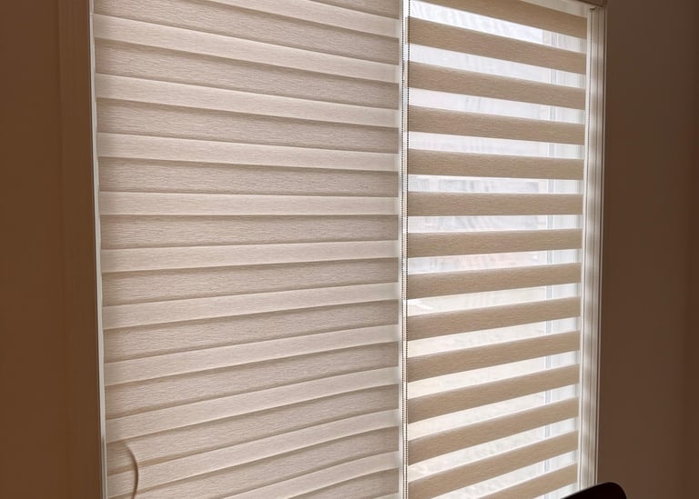 a dining room with a table and chairs