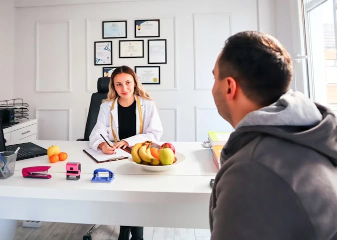 Woman doctor taking notes