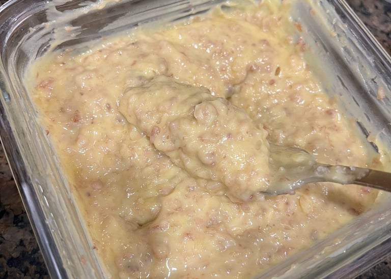 Creamy bone marrow butter mixture in a bowl showing consistency