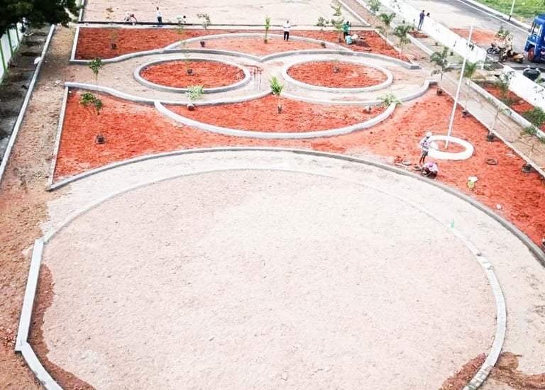 Green buffers and planned open spaces in plot layout by Garden Designers