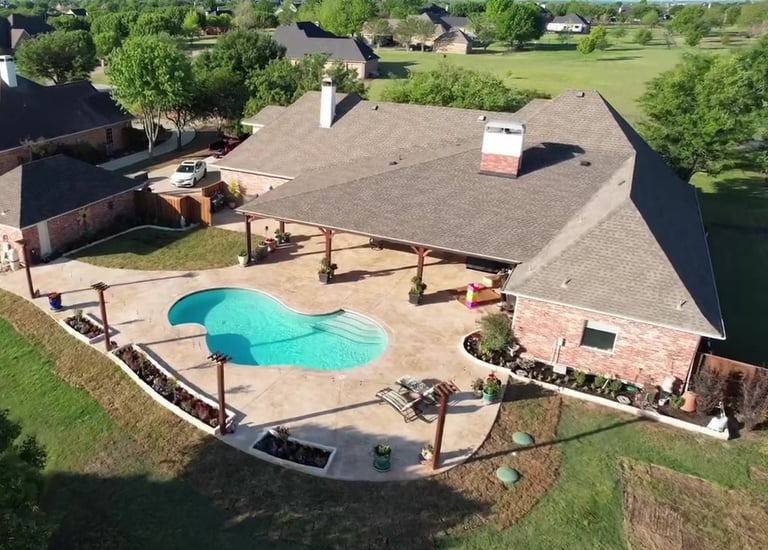 Outdoor Living Space with Pool in a Backyard