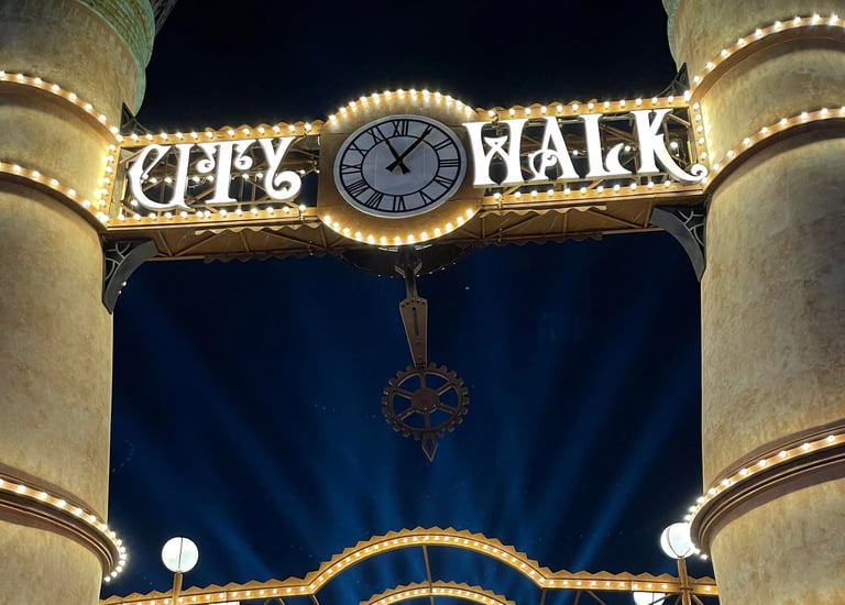 a city hall with a clock on the front of it