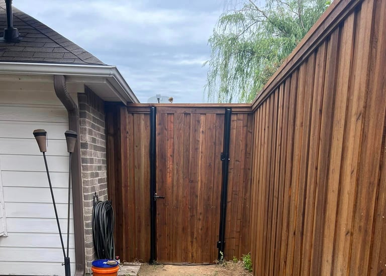 Dark Wood Fence Near House