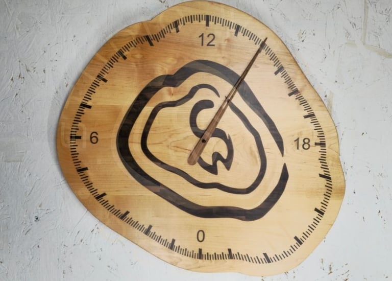 24-hour wood inlay clock in shape of logo