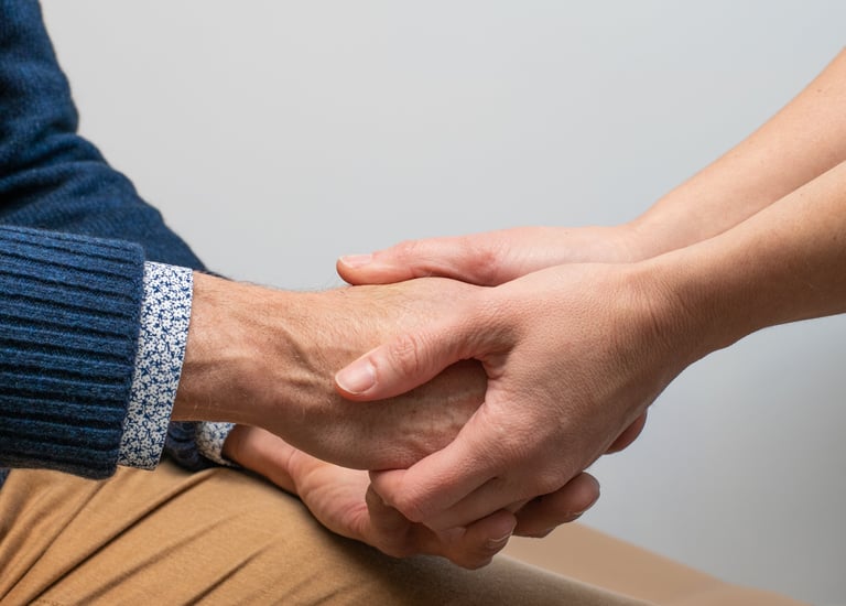 Holding hands in comfort at Zelena Medicine - compassionate holistic medicine in Basalt, CO