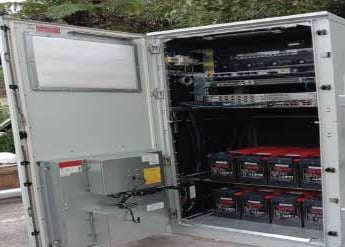 a large open door with a lot of electronics inside