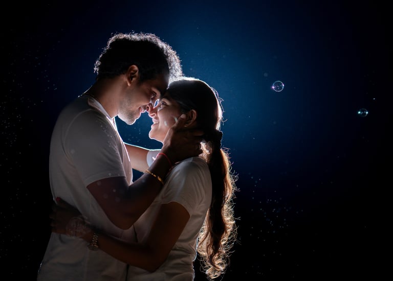 a couple in love at night, with bubbles in the air