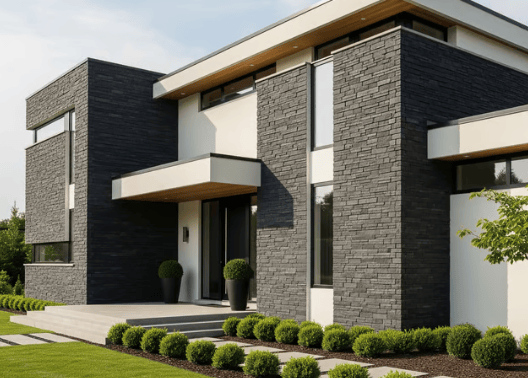 a house with a black and white stone exterior