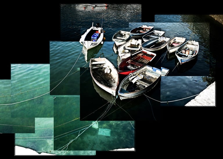 A photo joiner of small boats tied in a Cornish harbour