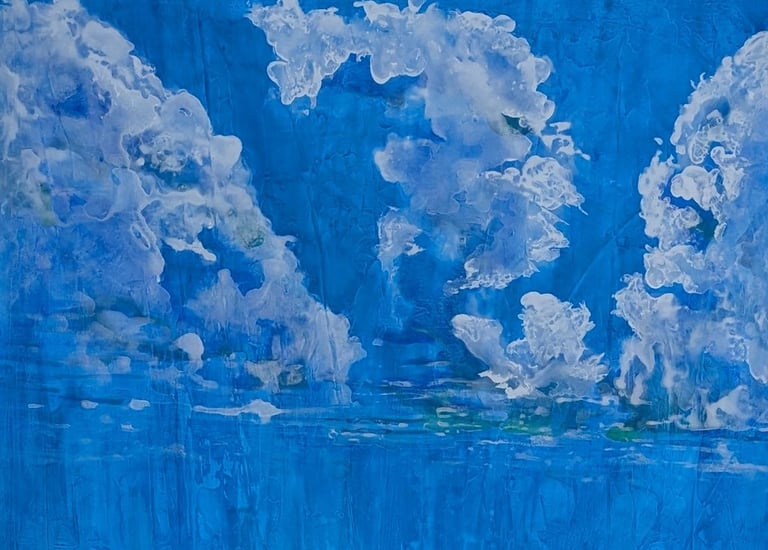 A color dense painting of a coral reef with a clouded blue sky above rendered in gloss acrylics on linen by Kathy LaFollett.