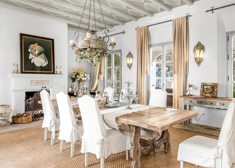 Elegant dining room with rustic beams at Finca Santa Katerina
