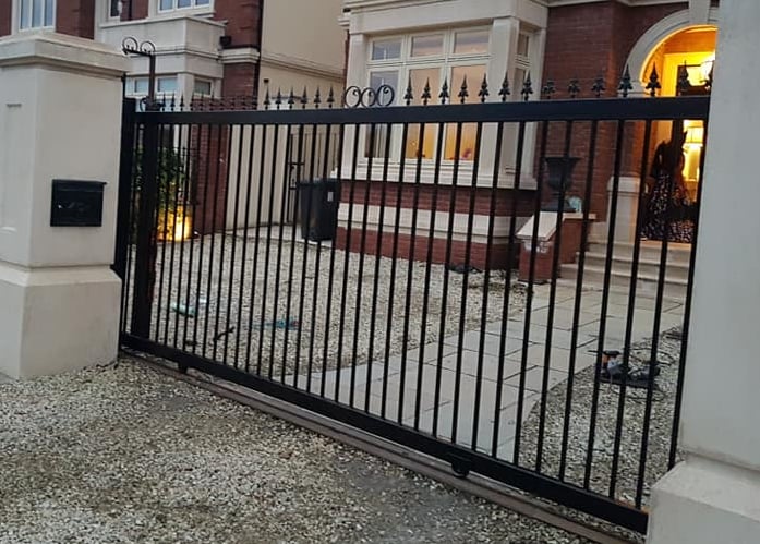Sliding gates for a driveway