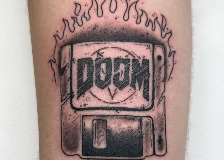 a tattoo style tattoo of a computer mouse on a computer monitor