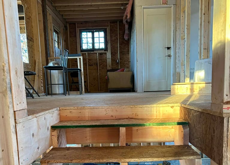 a room with a ladder and a ladder