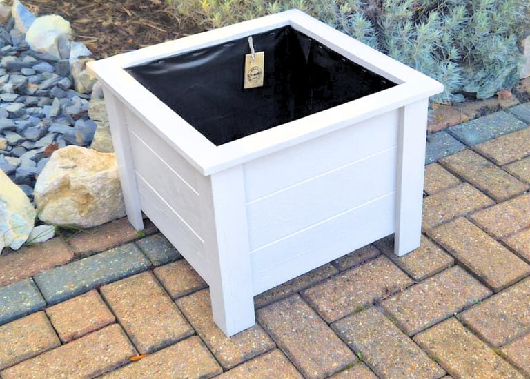 Wooden square planter on legs painted in white colour made from quality wood