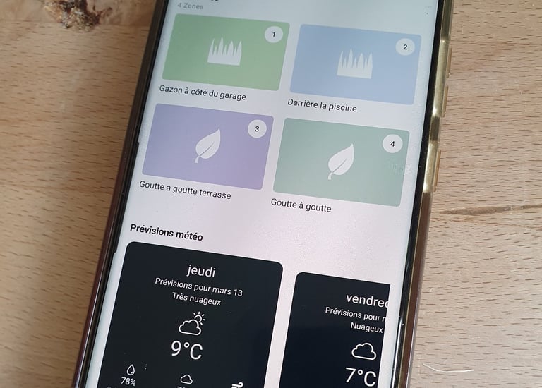 a phone with a phone showing a weather station