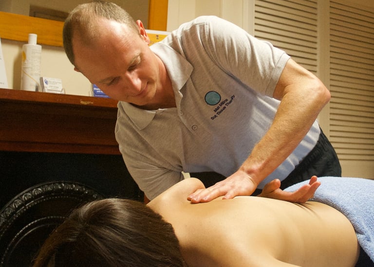 a woman is getting a massage