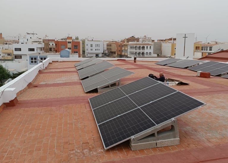 a solar paneled roof with solar panels on a roof