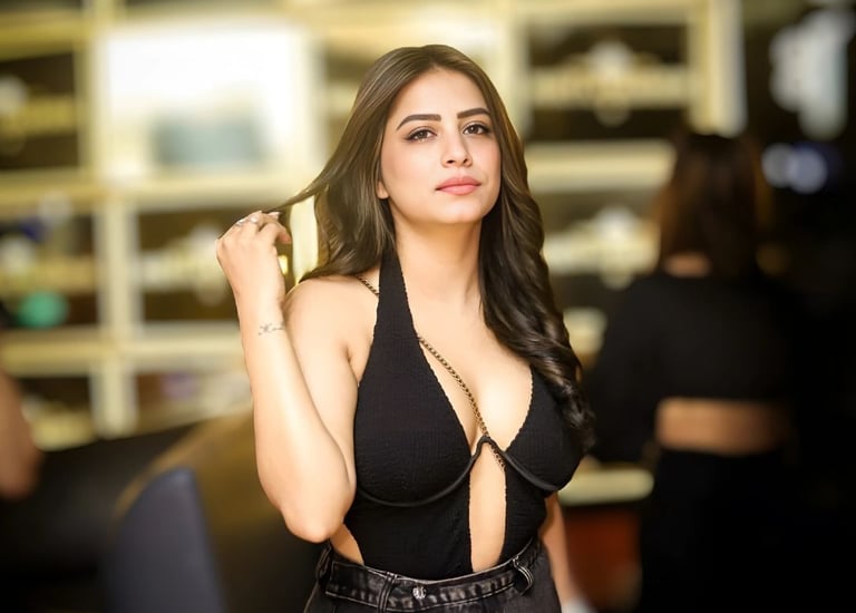 a woman in a black dress and a black dress