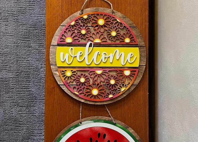 laser cut and colorfully painted wooden door or wall hangers