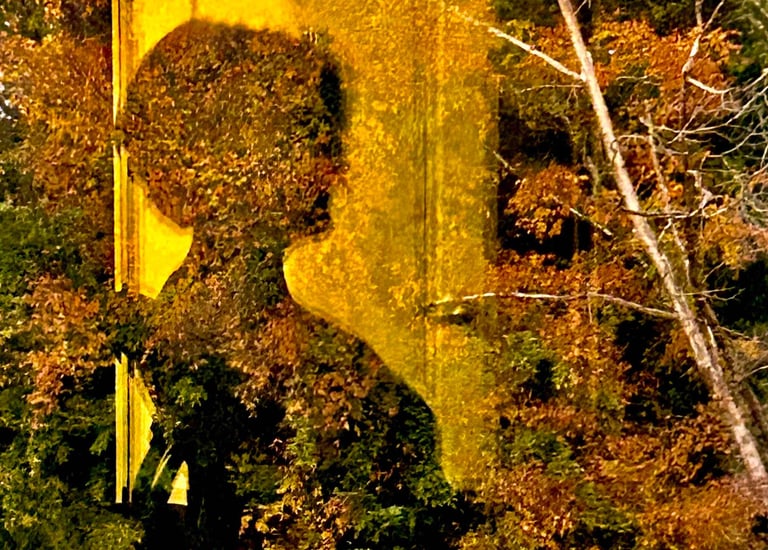 a person standing in front of a building with a clock