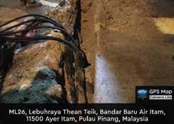a cowgirl is standing in the mud