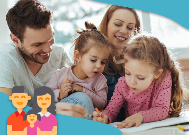 A happy family with two young daughters drawing and coloring together at home.