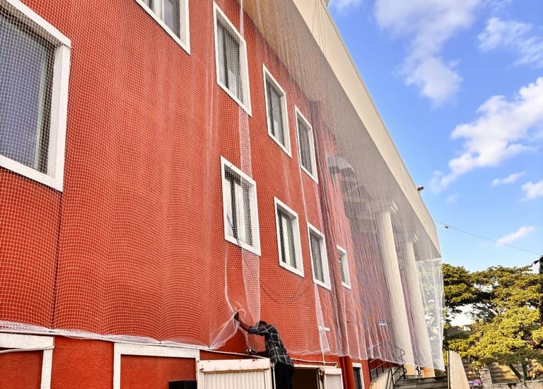 Wide shot of a balcony fitted with child-safe netting by Arjillo Enterprises.