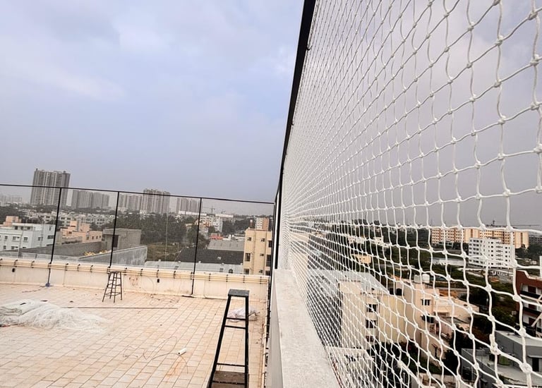 Close-up of white sports netting tightly fixed on a terrace.
