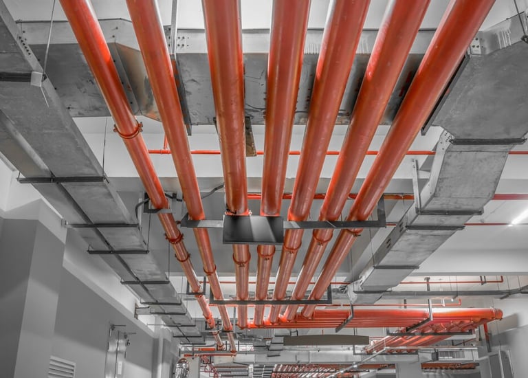 a long row of pipes in a building