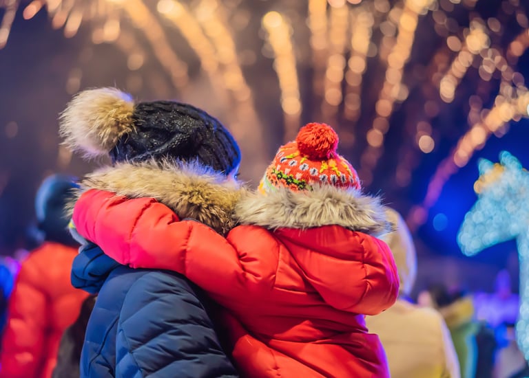 Father holding child enjoying Ballarat Winter Festival 2025 – family moment near winter lights