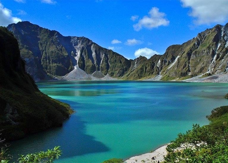 a lake with a mountain in the background