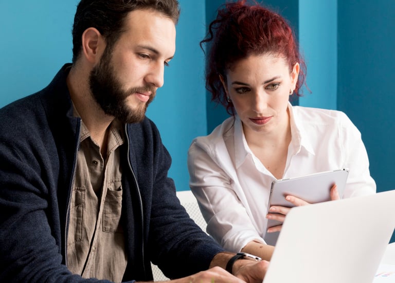 EZ Web Builds' team of experienced web designers and SEO experts working together on a client projec