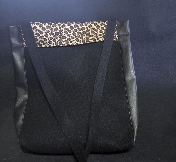 Magnet sling bag with vinyl side