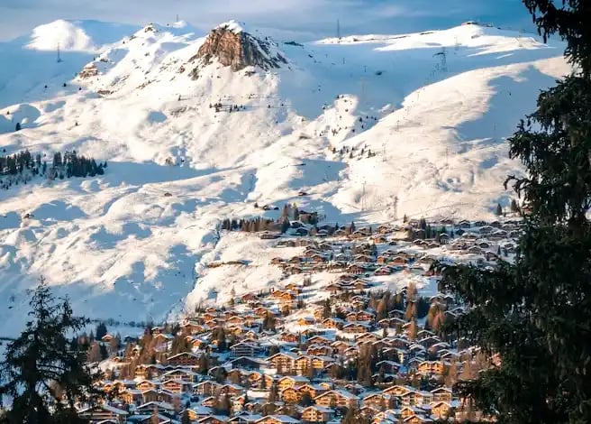 Verbier private day tour with driver-guide to alpine valleys and Mont Fort; private transfers.