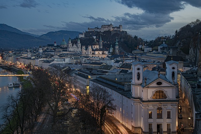 a cityscape of a castle with a castle in the background - JS Slachta Limousine Service