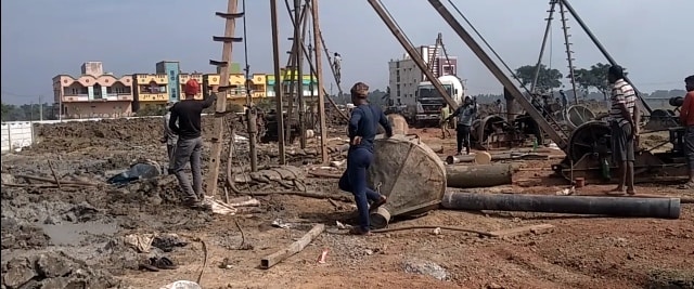 a group of men working on a construction site