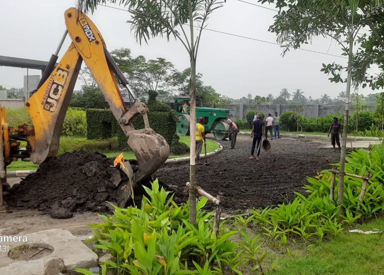 a JCB is being worked on by a man