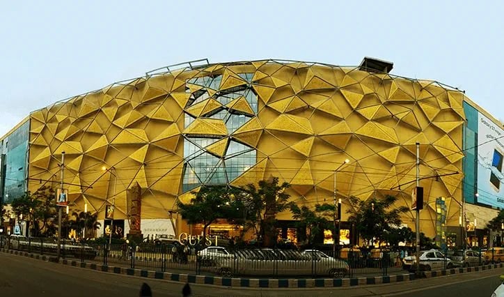 a large yellow building with a large yellow dome