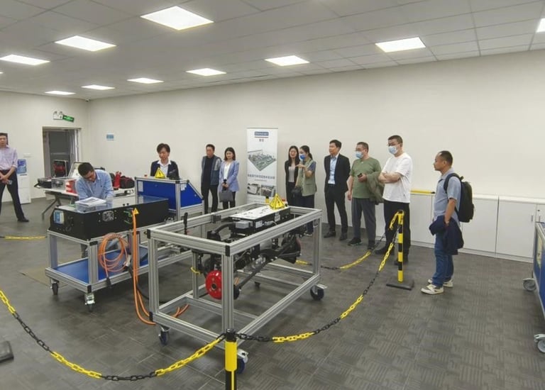 a group of people from other countries visit the lab